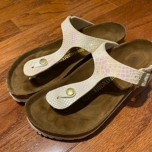 Gently used Birkenstock’s white iridescent